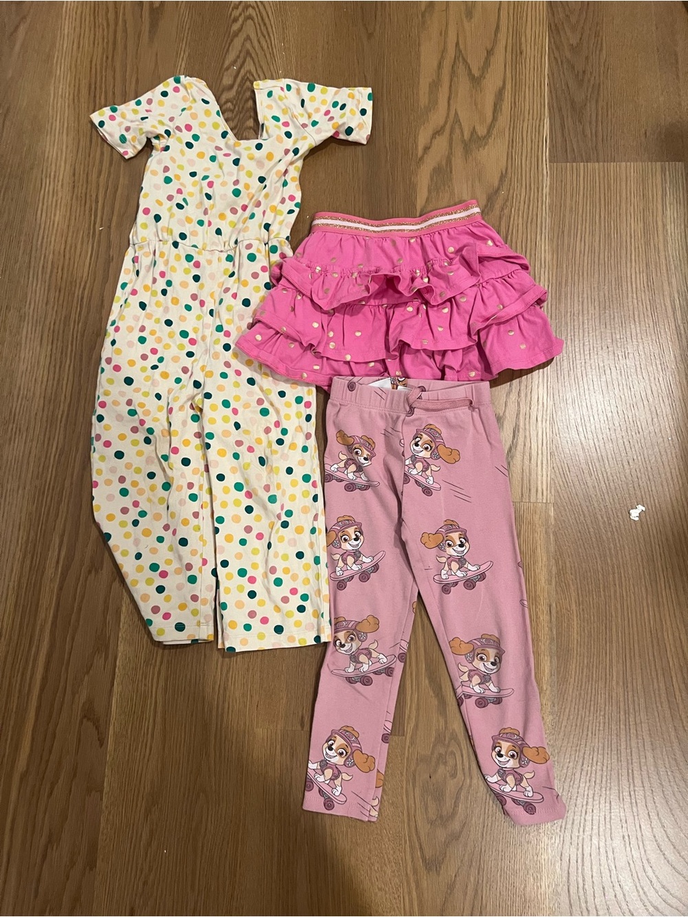 Mini Boden Pink Ruffle Skirt, Pink Character Leggings & Polka Dot Jumpsuit